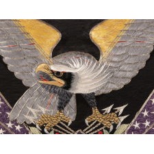 ELABORATE SAILOR’S SOUVENIR EMBROIDERY FROM THE ORIENT WITH A LARGE FEDERAL EAGLE, CROSSED FLAGS, CANNON AND ANCHOR, CA 1896-1907