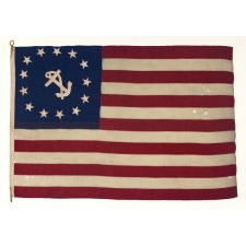 ANTIQUE AMERICAN PRIVATE YACHT FLAG (ENSIGN) WITH 13 STARS AROUND A CANTED ANCHOR, IN A VERY LARGE SCALE FOR THE FORM, MADE DURING THE LAST DECADE OF THE 19TH CENTURY