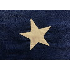 ANTIQUE AMERICAN PRIVATE YACHT FLAG (ENSIGN) WITH 13 STARS AROUND A CANTED ANCHOR, IN A VERY LARGE SCALE FOR THE FORM, MADE DURING THE LAST DECADE OF THE 19TH CENTURY