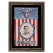 EXCEPTIONAL PARADE FLAG STYLE BANNER, WITH A LARGE EAGLE AND 13 STARS ABOVE A PORTRAIT OF THEODORE ROOSEVELT, SET WITHIN A RING OF OAK LEAVES & ACORNS; MADE FOR HIS 1912 PRESIDENTIAL CAMPAIGN