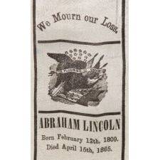 "WE MOURN OUR LOSS": SILK, 1865, ABRAHAM LINCOLN MOURNING RIBBON WITH AN EAGLE, PERCHED ON A FEDERAL SHIELD, BENEATH 13 STARS