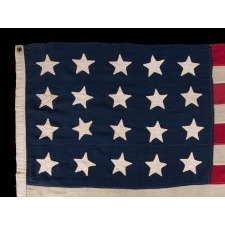 ANTIQUE AMERICAN FLAG WITH 20 STARS AND 13 STRIPES, PROBABLY A U.S. NAVY SMALL BOAT ENSIGN OF THE LATE CIVIL WAR ERA, MADE WHEN THERE WERE 20 FREE STATES