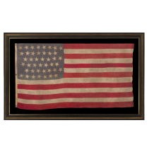 43 STAR ANTIQUE AMERICAN FLAG, ONE OF THE RAREST STAR COUNTS AMONG SURVIVING AMERICAN FLAGS OF THE 19TH CENTURY, REFLECTS THE ADDITION OF IDAHO IN 1890, ACCURATE FOR JUST 7 DAYS