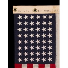 ANTIQUE AMERICAN FLAG WITH 48 STARS, A U.S. NAVY SMALL BOAT ENSIGN, MADE AT MARE ISLAND, CALIFORNIA, HEADQUARTERS OF THE PACIFIC FLEET, WWI-WWII ERA (1917-1945)
