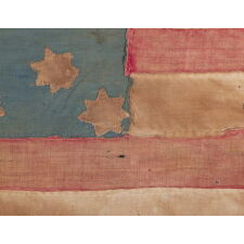15 STAR, 13 STRIPE FLAG WITH 7-POINTED STARS AND ITS CANTON RESTING ON A RED STRIPE, MADE DURING THE CIVIL WAR IN SAN BERNARDINO, CALIFORNIA BY SCHOOLGIRLS FOR JOHN BROWN, JR. (1847-1932), SON OF THE FAMOUS WESTERN PIONEER AND 49’ER, JOHN BROWN, SR. (1817-1899), GUIDE TO JOHN FREMONT & COMPANION OF KIT CARSON