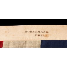 FLAG OF THE HAWAIIAN ISLANDS, ONE OF THE TWO EARLIEST EXAMPLES THAT I HAVE EVER ENCOUNTERED, MADE DURING THE MONARCHY, WITHIN THE PERIOD OF BRITISH PROTECTORATE; PRODUCED BY HORSTMANN & BROTHERS COMPANY IN PHILADELPHIA FOR DISPLAY AT THE 1876 CENTENNIAL INTERNATIONAL EXHIBITION