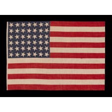 42 STAR ANTIQUE AMERICAN FLAG WITH SCATTERED STAR POSITIONING, AN UNOFFICIAL STAR COUNT, 1889-1890, WASHINGTON STATEHOOD