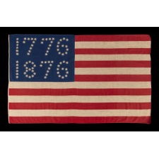 ANTIQUE AMERICAN FLAG WITH 10-POINTED STARS THAT SPELL “1776 – 1876”, MADE FOR THE 100-YEAR ANNIVERSARY OF AMERICAN INDEPENDENCE, ONE OF THE MOST GRAPHIC OF ALL EARLY EXAMPLES