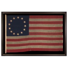 13 STAR ANTIQUE AMERICAN FLAG IN THE BETSY ROSS PATTERN, ONE OF JUST THREE EXAMPLES THAT I HAVE ENCOUNTERED THAT PRE-DATE THE 1890’s; AN EXTRAORDINARY FIND, CIVIL WAR PERIOD (1861-1865) OR JUST AFTER, EXTREMELY LARGE AMONG ITS COUNTERPARTS OF ALL PERIODS IN THIS DESIGN