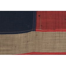 13 STAR ANTIQUE AMERICAN FLAG IN THE BETSY ROSS PATTERN, ONE OF JUST THREE EXAMPLES THAT I HAVE ENCOUNTERED THAT PRE-DATE THE 1890’s; AN EXTRAORDINARY FIND, CIVIL WAR PERIOD (1861-1865) OR JUST AFTER, EXTREMELY LARGE AMONG ITS COUNTERPARTS OF ALL PERIODS IN THIS DESIGN