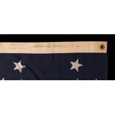 44 STARS IN AN INTERESTING, NOTCHED CONFIGURATION, ON AN ANTIQUE AMERICAN FLAG MADE BY THE U.S. BUNTING COMPANY IN LOWELL, MASSACHUSETTS, REFLECTS THE ERA WHEN WYOMING WAS THE MOST RECENT STATE TO JOIN THE UNION, 1890-1896