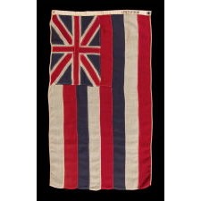 FLAG OF THE UNITED STATES TERRITORY OF HAWAII, THAT WOULD EVENTUALLY BECOME THE FLAG OF THE STATE; EXHIBITS AN UNUSUAL VARIANT OF THE BRITISH UNION FLAG AND GREAT COLORS, MADE circa 1900-1915, SIGNED “LOCKWOOD”