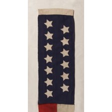 13 STARS WITH SHORT, CONICAL ARMS ON A SMALL SCALE SHIP'S COMMISSION PENNANT WITH UNUSUAL WIDTH, PROBABLY MADE FOR A PRIVATE YACHT, CA 1896-1908, POSSIBLY MADE BY J.S. OBERHOLZER, PHILADELPHIA