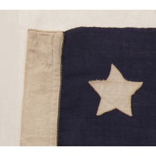 13 STARS WITH SHORT, CONICAL ARMS ON A SMALL SCALE SHIP'S COMMISSION PENNANT WITH UNUSUAL WIDTH, PROBABLY MADE FOR A PRIVATE YACHT, CA 1896-1908, POSSIBLY MADE BY J.S. OBERHOLZER, PHILADELPHIA