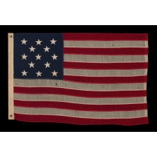 13 STAR ANTIQUE AMERICAN FLAG WITH A 3-2-3-2-3 CONFIGURATION OF STARS; A SMALL-SCALE EXAMPLE OF THE 1895-1926 ERA WITH ESPECIALLY NICE VISUAL QUALITIES