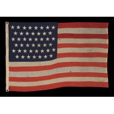 45 STARS ON AN ANTIQUE AMERICAN FLAG IN AN EXTREMELY SMALL SCALE AMONG EXAMPLES OF THE PERIOD WITH PIECED-AND-SEWN CONSTRUCTION, 1896-1907, SPANISH-AMERICAN WAR ERA, REFLECTS UTAH STATEHOOD
