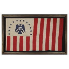RARE REVENUE CUTTER SERVICE FLAG WITH A BLUE EAGLE AMID AN ARCH OF 13 BLUE STARS, ON A WHITE FIELD, AND AN UNUSUAL COUNT OF 17 VERTICAL RED AND WHITE STRIPES, CA 1880-1895