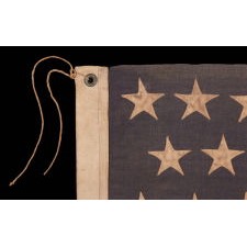 45 STAR ANTIQUE AMERICAN FLAG WITH STAGGERED ROWS OF STARS ON A DUSTY BLUE CANTON; REFLECTS THE PERIOD WHEN UTAH WAS THE MOST RECENT STATE TO JOIN THE UNION, 1890-1896