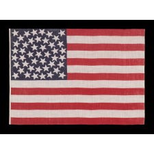 45 STARS ON AN ANTIQUE AMERICAN PARADE FLAG WITH A MEDALLION CONFIGURATION, A RARE FEATURE IN THIS PERIOD, 1896-1908, UTAH STATEHOOD