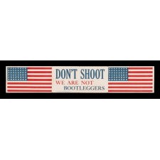 “DON’T SHOOT, WE ARE NOT BOOTLEGGERS.” A PRINTED PAPER SIGN FROM A DETROIT MAKER, DURING PROHIBITION, WITH A 1929 COPYRIGHT