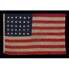 30 STARS ON AN ANTIQUE AMERICAN FLAG, PROBABLY MADE AT THE TIME OF OUR NATION’S 100TH ANNIVERSARY OF INDEPENDENCE, TO COMMEMORATE WISCONSIN STATEHOOD IN 1848, LIKELY FOR USE AT THE CENTENNIAL INTERNATIONAL EXHIBITION