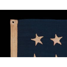 30 STARS ON AN ANTIQUE AMERICAN FLAG, PROBABLY MADE AT THE TIME OF OUR NATION’S 100TH ANNIVERSARY OF INDEPENDENCE, TO COMMEMORATE WISCONSIN STATEHOOD IN 1848, LIKELY FOR USE AT THE CENTENNIAL INTERNATIONAL EXHIBITION