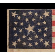 30 STARS ON AN ANTIQUE AMERICAN FLAG OF THE PRE-CIVIL WAR ERA, RARE AND BEAUTIFUL, WITH A MEDALLION CONFIGURATION THAT FEATURES A HALOED CENTER STAR, WISCONSIN STATEHOOD, 1848-1850