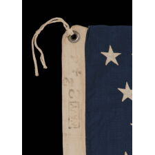 44 STAR ANTIQUE AMERICAN FLAG, IN AN EXCEPTIONALLY SMALL SCALE AMONG ITS PIECED-AND-SEWN COUNTERPARTS, REFLECTS WYOMING STATEHOOD, 1890-1896