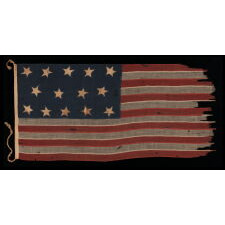 EXTREMELY RARE 14-STAR, 13-STRIPE FLAG, LIKELY MADE DURING THE ANTEBELLUM WITH AN ABOLITIONIST MESSAGE, ENTIRELY HAND-SEWN AND WITH ENDEARING WEAR FROM OBVIOUS USE, POSSIBLY OF U.S. NAVY ORIGIN, circa 1846-1848; EXHIBITED JUNE- SEPTEMBER, 2021 AT THE MUSEUM OF THE AMERICAN REVOLUTION