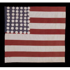 EXTRAORDINARY WWII LIBERATION FLAG WITH 48 SAWTOOTH STARS, THEIR NUMBER OF POINTS VARYING FROM 11 TO 16, AND A COMPLEMENT OF 10 STRIPES; MADE TO WELCOME U.S. TROOPS IN FRANCE IN 1944, FOLLOWING LIBERATION FROM THE GERMANS; AMONG THE BEST OF ITS KIND KNOWN TO EXIST; FOUND IN A PARIS ATTIC