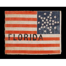 31 STARS ARRANGED IN A RARE VARIATION OF THE “GREAT STAR” PATTERN, WITH THE WORD "FLORIDA" PAINTED IN THE STRIPES, PART OF A GROUP OF REPRESENTING VARIOUS STATES, REPORTED TO HAVE BEEN USED AT THE WIGWAM CONVENTION (THE 1860 REPUBLICAN NATIONAL CONVENTION) IN CHICAGO; THIS EXACT FLAG ILLUSTRATED IN “COLLECTING LINCOLN” BY SCHNEIDER