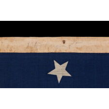 34 STARS IN 4 ROWS WITH 2 STARS OFFSET AT THE HOIST END, ON AN ANTIQUE AMERICAN FLAG LIKELY PRODUCED FOR MILITARY FUNCTION, AS UNION ARMY CAMP COLORS; ONE OF JUST A TINY HANDFUL THAT I HAVE ENCOUNTERED IN THIS EXACT STYLE, REFLECTS KANSAS STATEHOOD, OPENING TWO YEARS OF THE CIVIL WAR, 1861-1863