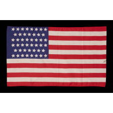 46 STAR, SLIK, ANTIQUE AMERICAN FLAG, WITH STARS IN CANTED ROWS, REFLECTS THE ADDITION OF OKLAHOMA TO THE UNION DURING THE PRESIDENCY OF THEODORE ROOSEVELT, 1907-1912