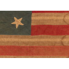 HOMEMADE, 13 STAR, ANTIQUE AMERICAN FLAG WITH A 3-2-3-2-3 STAR CONFIGURATION AND EXTREMELY UNUSUAL CONSTRUCTION, PROBABLY MADE FOR THE 1876 CENTENNIAL OF AMERICAN INDEPENDENCE