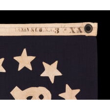 ANTIQUE AMERICAN PRIVATE YACHT ENSIGN WITH 13 SINGLE-APPLIQUÉD, HAND-SEWN STARS & CANTED ANCHOR, A BEAUTIFUL EXAMPLE, MADE BY ANNIN IN NEW YORK CITY, CIRCA 1865-1885