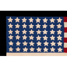 48 STARS ON A CROCHETED AMERICAN FLAG, PROBABLY MADE IN THE PATRIOTISM OF WWII (U.S. INVOLVEMENT 1941-1945), A BEAUTIFUL EXAMPLE, WITH LARGE, WELL-EXECUTED STARS AND STRIKING COLORS