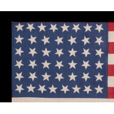 44 STARS IN JUSTIFIED ROWS, WITH VARIED STAR POSITIONING, ON A SILK, ANTIQUE AMERICAN FLAG WITH STRIKING COLORS, REFLECTS WYOMING STATEHOOD, circa 1890-1896