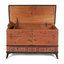 PAINTED, CENTRE COUNTY, PENNSYLVANIA BLANKET CHEST IN SALMON AND BLACK WITH FLORAL DECORATION, 3 DRAWERS, AND APPLIED, SPLAY FEET, circa 1815-1825