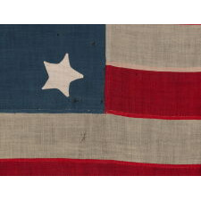 ANTIQUE AMERICAN FLAG WITH 28 STARS, REFLECTS THE ADDITION OF TEXAS TO THE UNION AS THE 28TH STATE IN 1845; ONE OF THE RAREST STAR COUNTS IN AMERICAN HISTORY, OFFICIAL FOR JUST ONE YEAR (1845-46), MEXICAN WAR ERA