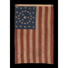 34 STAR ANTIQUE AMERICAN FLAG WITH AN EXCEPTIONALLY RARE CIRCLE-IN-A-SQUARE CONFIGURATION AND A “Y” FORMATION OF STARS IN THE CENTER, ONE OF JUST THREE OR FOUR KNOWN EXAMPLES IN THIS STYLE; OPENING TWO YEARS OF THE CIVIL WAR, 1861-1863, KANSAS STATEHOOD, POSSIBLY A UNION ARMY CAMP COLORS