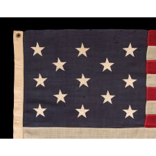 13 STAR ANTIQUE AMERICAN FLAG WITH A 3-2-3-2-3 CONFIGURATION OF STARS ON AN ATTRACTIVE, INDIGO BLUE CANTON AND WITH BEAUTIFUL, ELONGATED PROPORTIONS, LAST DECADE 19TH CENTURY