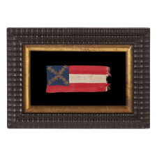 CONFEDERATE BIBLE FLAG IN THE FIRST NATIONAL DESIGN, WITH 13 GILT FOIL STARS, MADE OF SILK AND ENTIRELY HAND-SEWN, WITH ITS STARS CONFIGURED IN AN EXCEPTIONALLY RARE SALTIRE, AND EMBROIDERED TEXT THAT READS: “GLORIE ET LIBERTE” (GLORY & LIBERTY); ACCOMPANIED BY AN 1863 LETTER, WRITTEN BY A WOMAN IN NEW ORLEANS TO A CONFEDERATE SOLDIER IN VICKSBURG, MISSISSIPPI