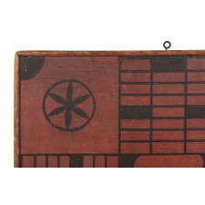 AMERICAN PARCHEESI BOARD IN SALMON & BLACK PAINT, WITH DUTCH STYLE PINWHEEL DECORATION, EXCEPTIONAL SURFACE, GREAT GRAPHICS, AND IMPRESSIVE SCALE, circa 1830-1850