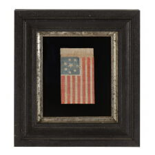 8 STARS WITH WHIMSICAL PROFILES ON AN ANTIQUE AMERICAN PARADE FLAG OF THE CIVIL WAR PERIOD, MADE TO REFLECT CONFEDERATE SYMPATHIES, DENOTES VIRGINIA SECESSION IN 1861, EXTREMELY SCARCE