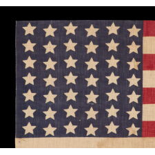 42 STARS ON AN ANTIQUE AMERICAN FLAG WITH A WAVE CONFIGURATION OF LINEAL COLUMNS, AN UNOFFICIAL STAR COUNT THAT REFLECTS THE ADDITION OF WASHINGTON STATE, MONTANA, AND THE DAKOTAS, circa 1889-1890