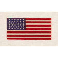 38 STAR AMERICAN FLAG RIBBON WITH JUSTIFIED ROWS OF CANTED STARS AND AN ATTRACTIVE, ELONGATED PROFILE, COLORADO STATEHOOD, 1876-1889