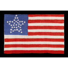 34 STARS IN A "GREAT STAR" PATTERN ON AN ANTIQUE AMERICAN PARADE FLAG WITH A BRILLIANT, ROYAL BLUE CANTON, MADE OF SILK; OPENING TWO YEARS OF THE CIVIL WAR, 1861-63, KANSAS STATEHOOD