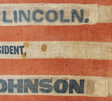 1864 LINCOLN & JOHNSON PRESIDENTIAL CAMPAIGN PARADE FLAG, RECYCLED FROM AN 1860 JOHN BELL, CONSTITUTIONAL UNION PARTY FLAG, WITH 35 STARS ARRANGED IN A UNIQUE VARIANT OF A "PENTAGON" OR "HEART" MEDALLION