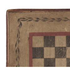MASTERPIECE QUALITY COMBINATION FOX & GEESE AND MILL GAME BOARD, IN ORIGINAL AND UNTOUCHED RED, OCHRE WHITE AND BLUE PAINT, WITH PINWHEEL QUILT PATTERN DESIGN IN THE CENTER AND A WINDING VINE BORDER, CA 1820-1845, WITH CHECKERS ON THE REVERSE, FRESH-TO-THE-MARKET FROM A TOP DEALER'S OWN COLLECTION