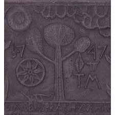 MID-18th CENTURY CAST IRON FIRE BACK WITH A LARGE, THREE-LIMBED TREE, A PLOW, TULIPS, AND BIBLICAL VERSE; ATTRIBUTED TO IRONMASTER THOMAS MAYBURY AT HEREFORD FURNACE, BERKS COUNTY, PENNSYLVANIA, DATED 1747